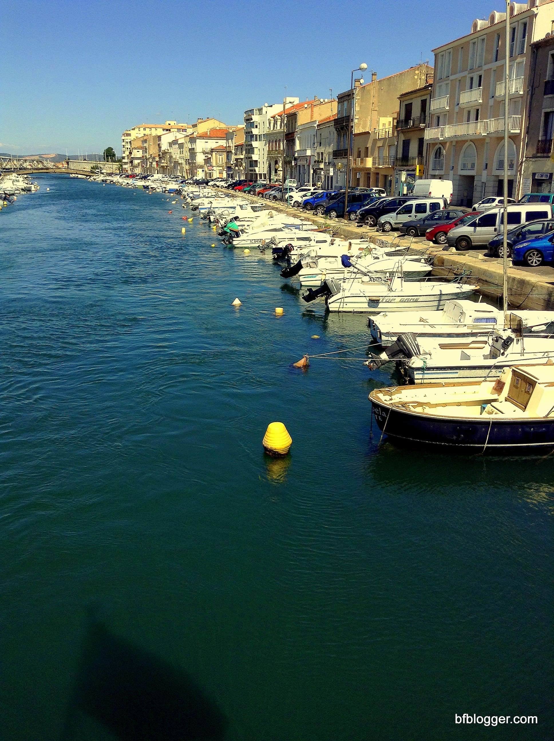 Boats parked in town are almost as numerous as cars.