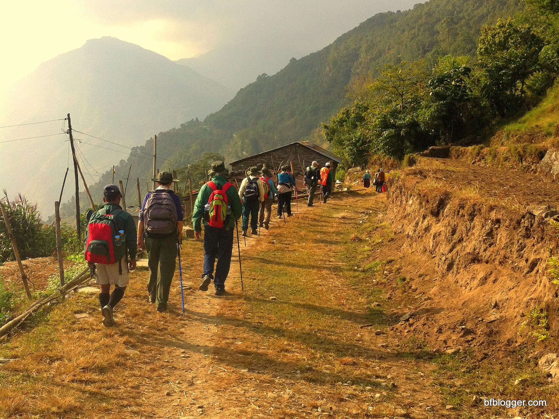 Trekking on rough roads in Nepal that climb up steep mountains