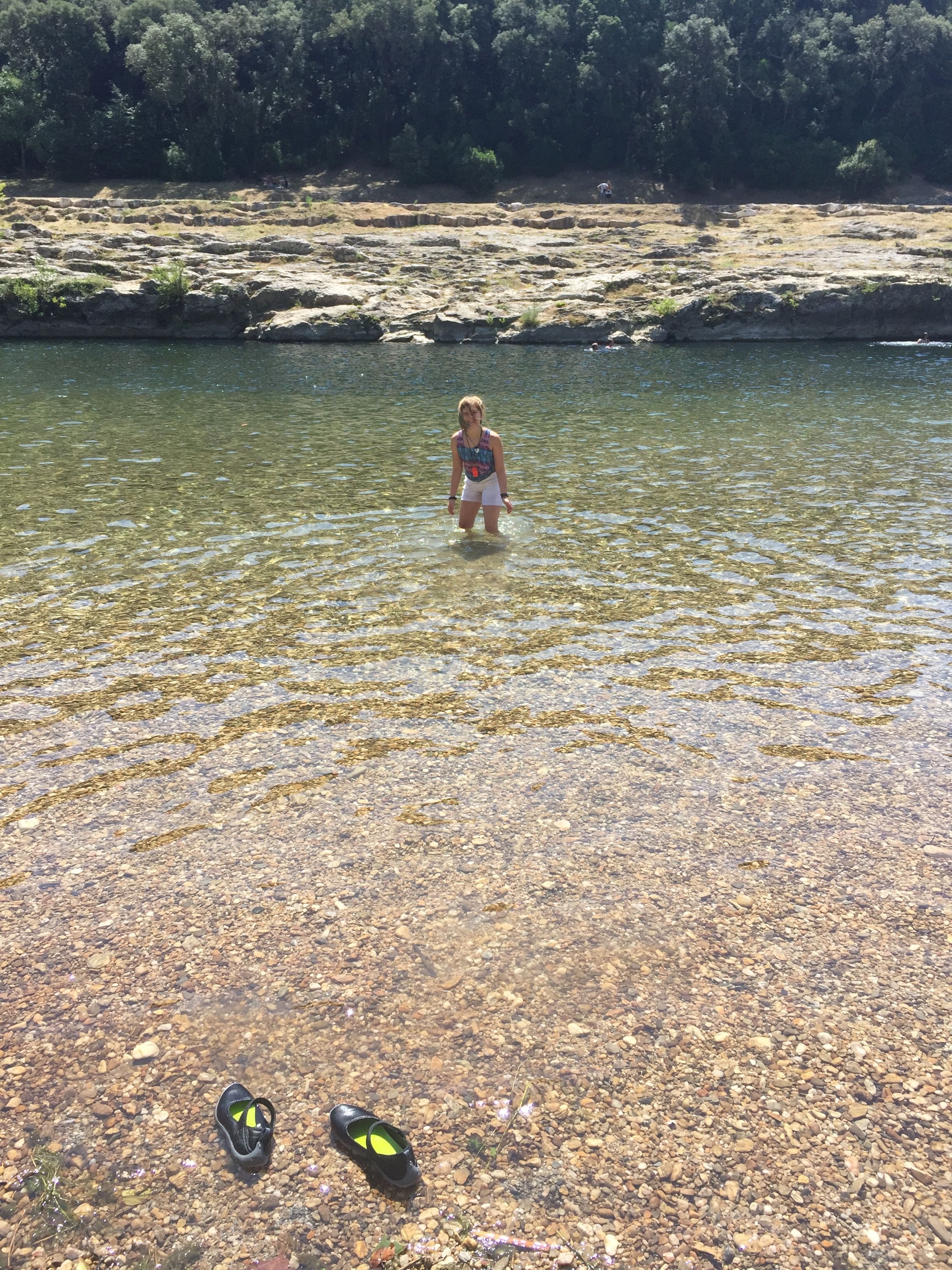 Wading in the river of the Pont du Gard